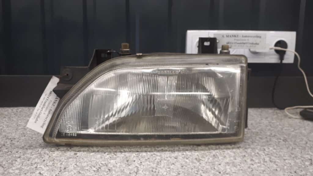91ag13006c2b reflektor lewy ford escort mk5