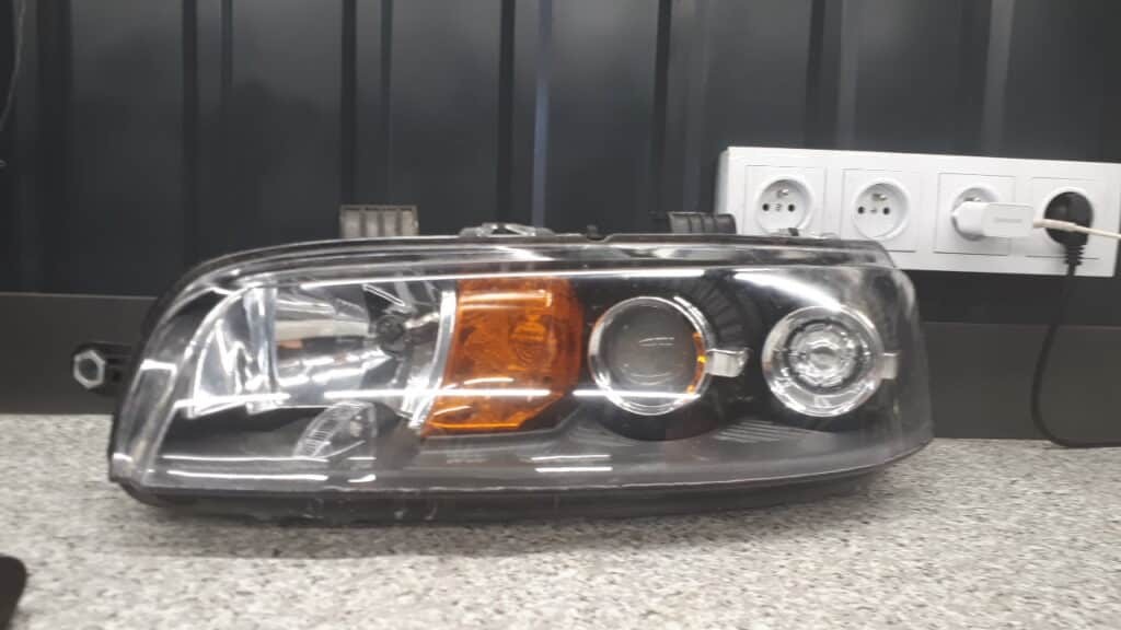 20-5958 Reflektor lewy fiat punto 188 Tyc