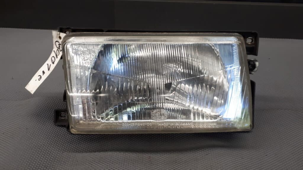 Reflektor prawy Vw Polo II 92r HELLA
