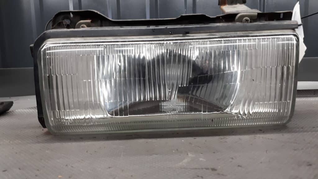 reflektor mazda 626 II lewy Stanley