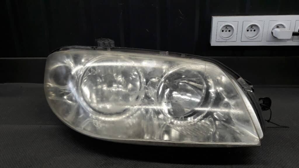 89101063DX Reflektor prawy Fiat Punto II Lift
