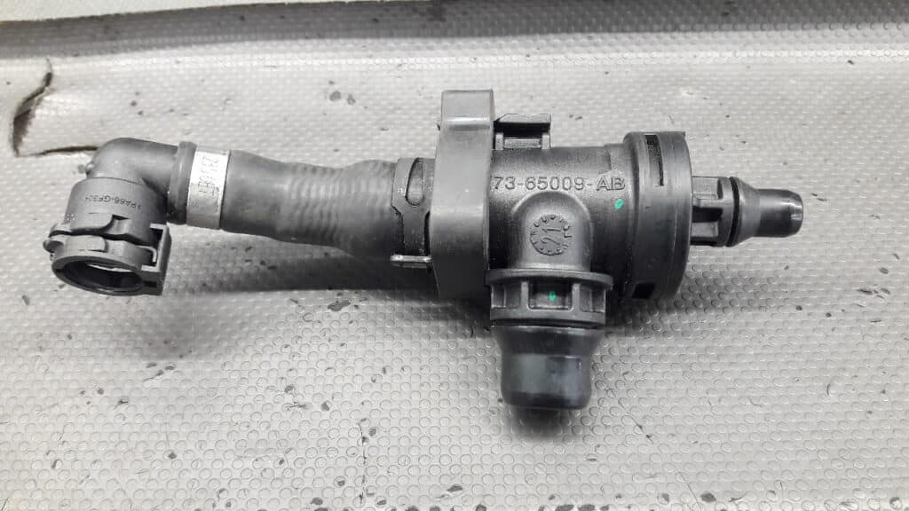 HX73-65009-AB pompa wody Jaguar XF 2.0 21r