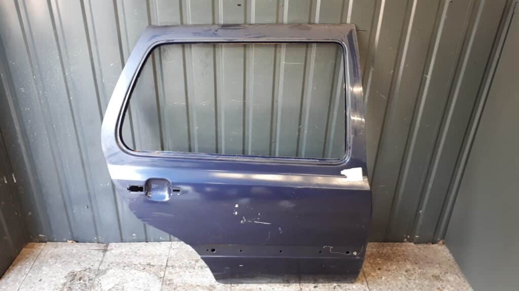 Drzwi prawy tył VW Golf III granatowe