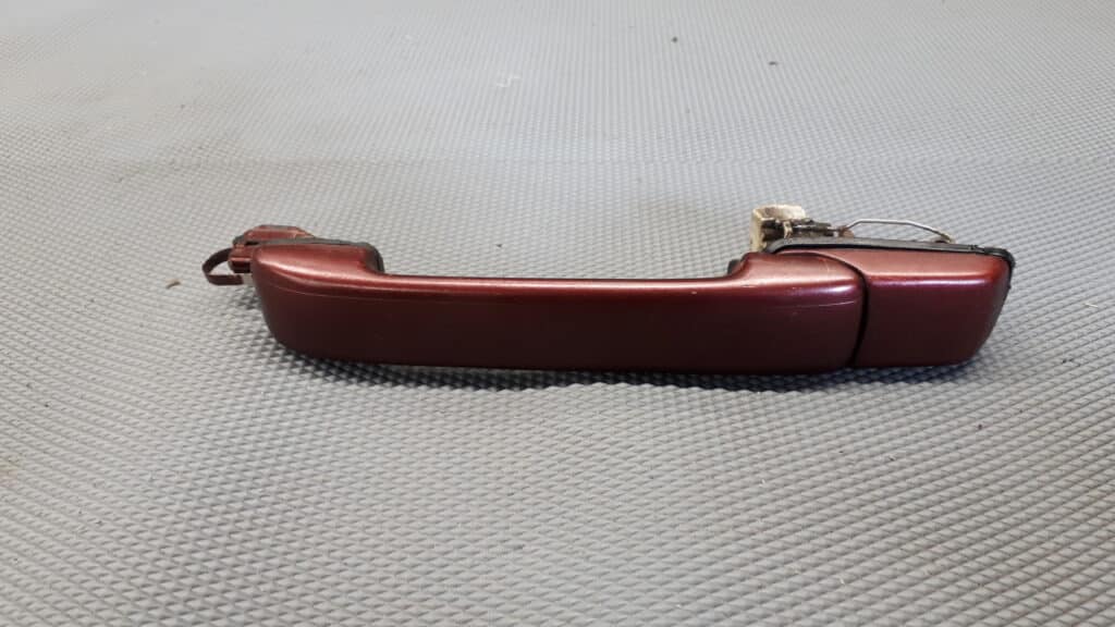 1H0837209 Klamka lewy tyl vw vento 1993r bordo
