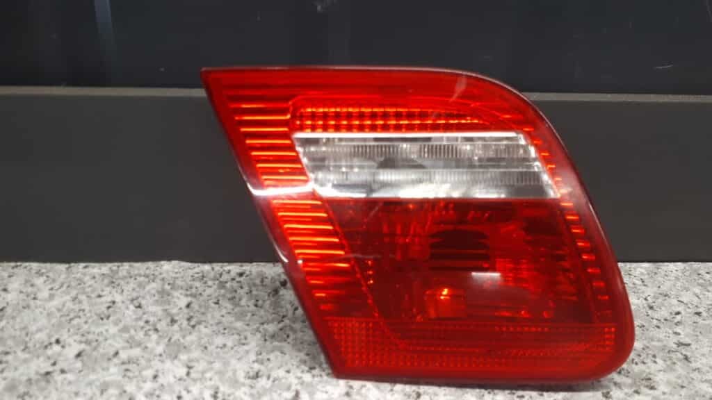 6920705 lampa lewy tyl w klape bmw e46