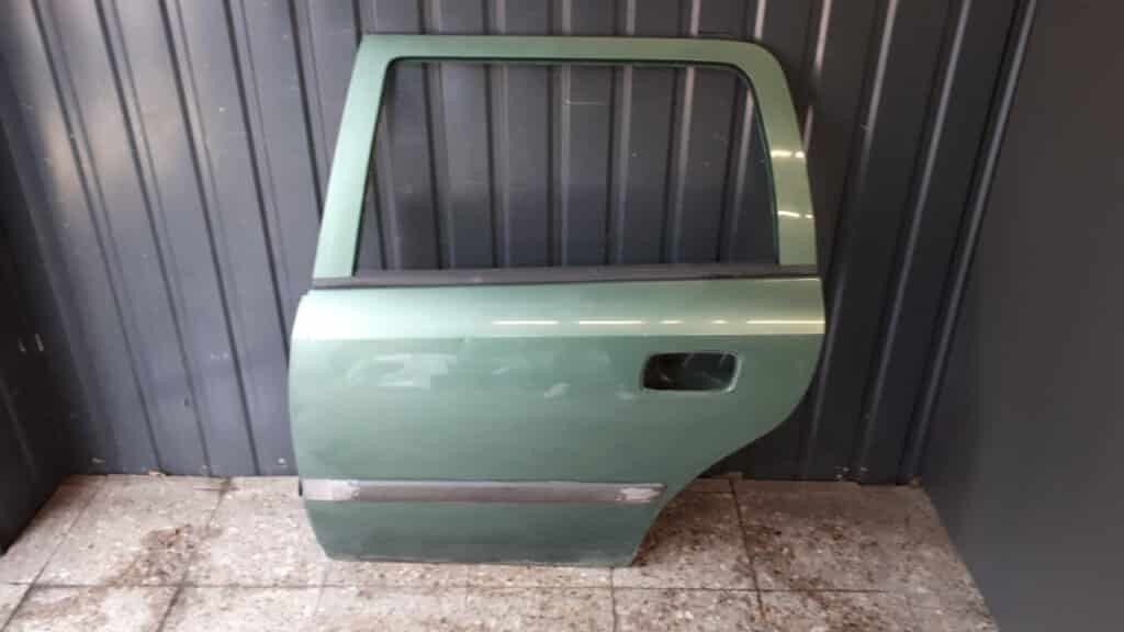 Drzwi lewy tył Opel Astra II kombi