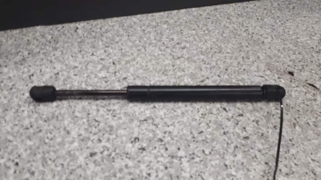 8151579 Siłownik klapy tył bagażnika Bmw E36 Cabrio