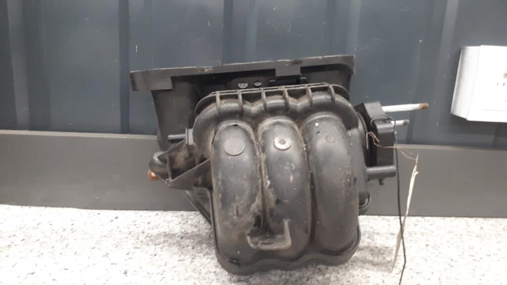 1027229s01 kolektor ssący Suzuki Alto 1.1