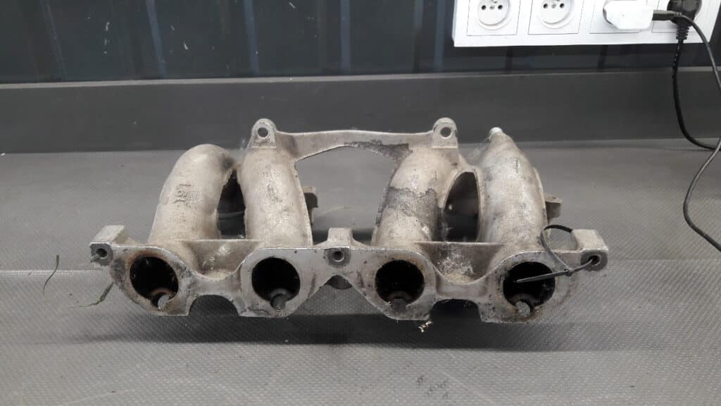 17097959 Kolektor ssący BMW E30 316i