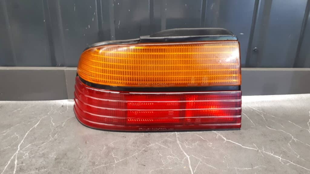 043-7829l Lampa tylna lewa  mazda 626 III stanley