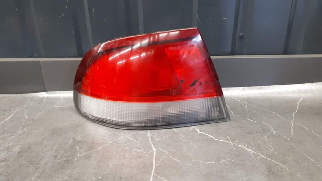 043-1395 lampa lewy tyl mazda 626 96r europa sedan
