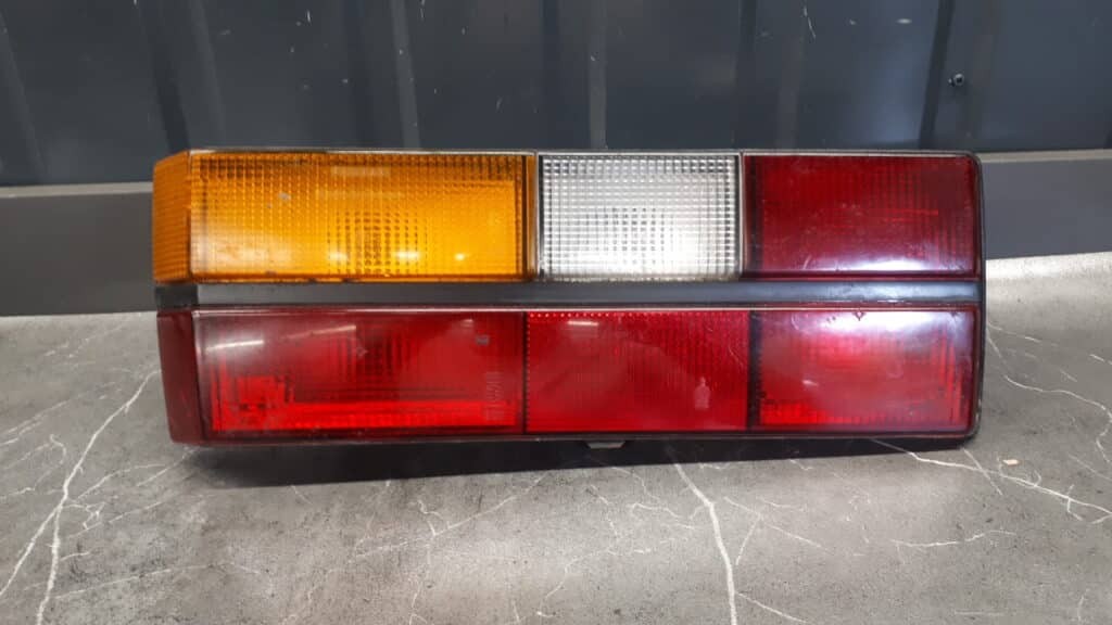 171945257H Lampa lewa vw golf I 82r