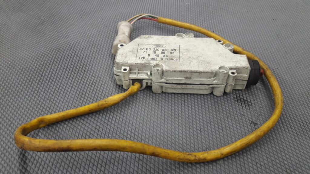 87BG220A20 Siłownik zamka lewy tył ford scorpio