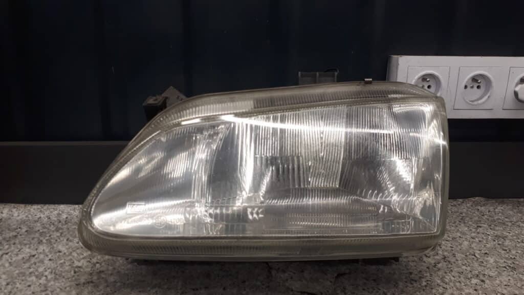 7701672734 reflektor lewy renault scenic I 97r Valeo