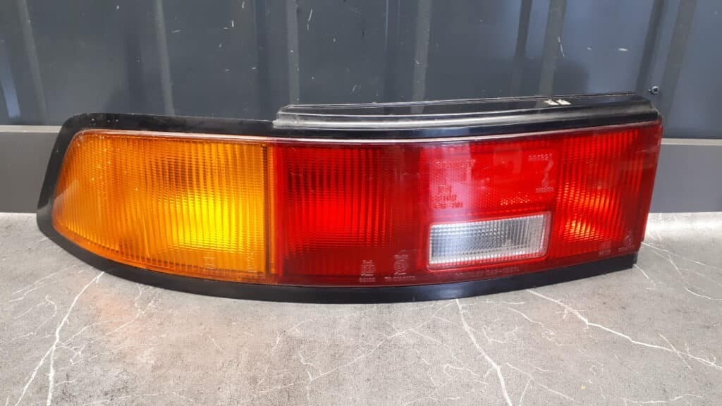 043-1321 Lampa lewy  tyl mazda 323 stanley europa