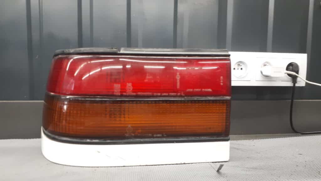 7r017656 lampa lewy tyl Toyota Carina II