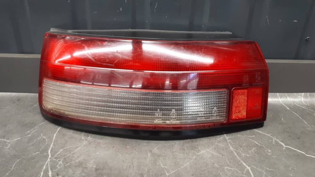 Lampa lewy tył Mazda 323 90r