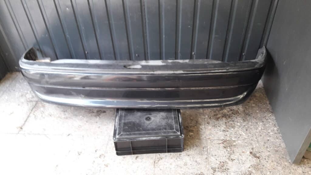 90380390 90452070 Zderzak tyl Opel Astra F 5D Sedan Szary
