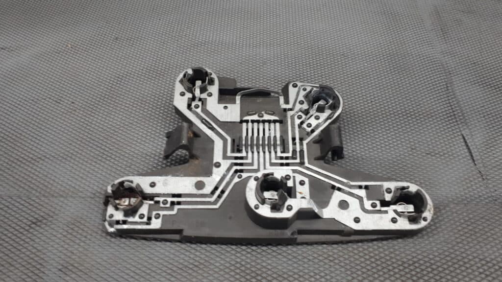 7700828137 Wklad lampy lewy RENAULT MEGANE I HB
