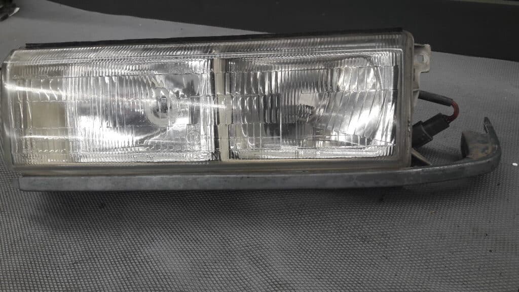 reflektor nissan vanette C22 BUS lewy