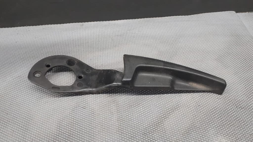 4462331 Rączka mechanizm podnoszenia fotela Megane III