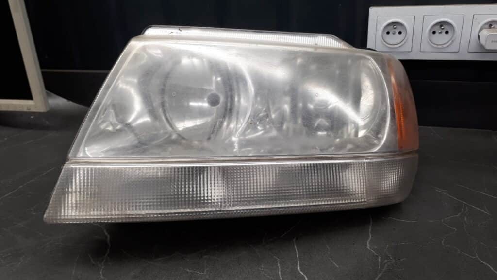 reflektor lewy jeep wj 03r