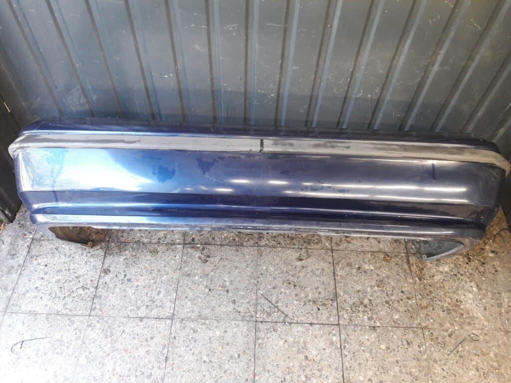 90461774 zderzak tyl opel calibra a granatowy
