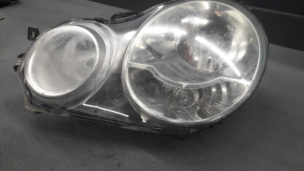 1305630385 reflektor lewy vw polo 9n
