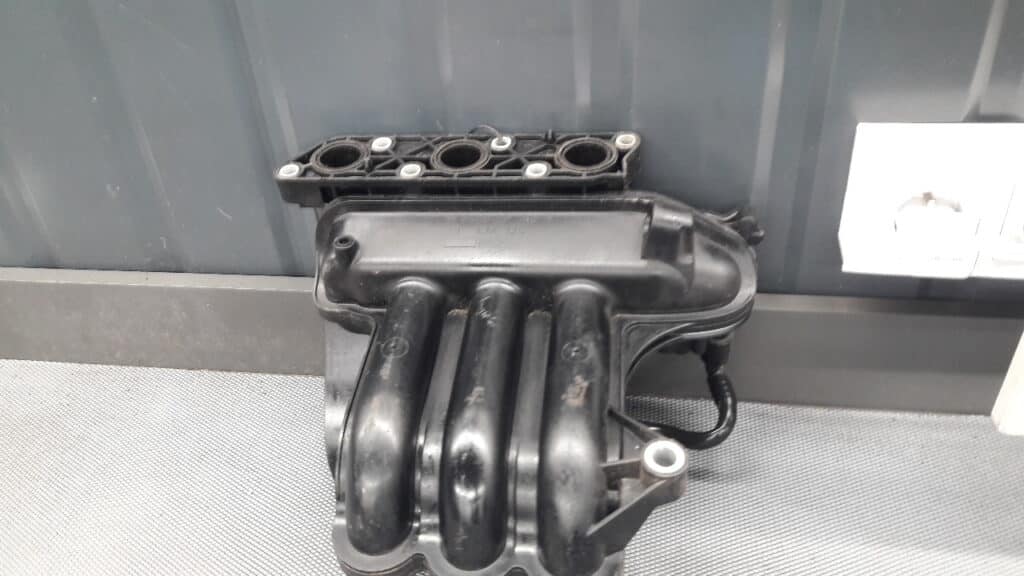 03D129766L Kolektor SSACY SKODA FABIA I 1.2