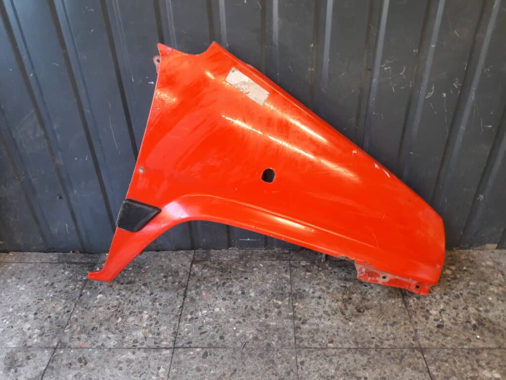 Błotnik prawy przód Honda Jazz I czerwony