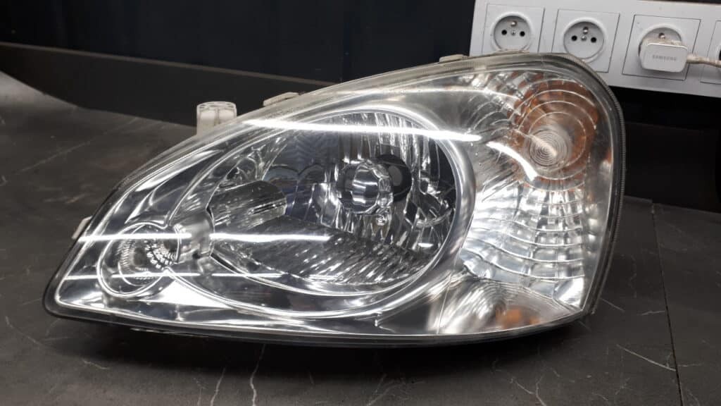 reflektor lewy przod tata indica v2 07r