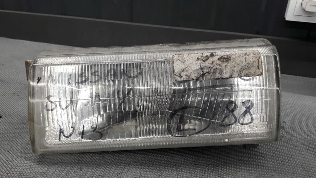 reflektor lewy NISSAN SUNNY n13 88