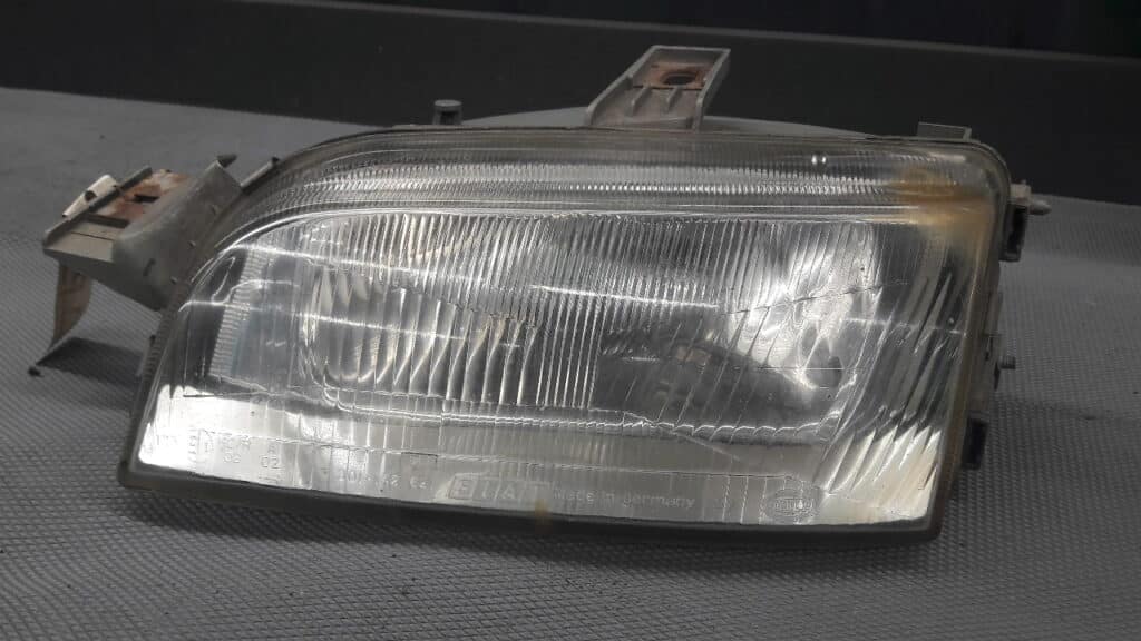 l142597-00 reflektor lewy fiat punto I 96R