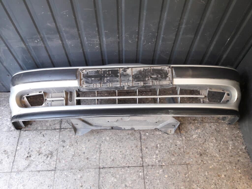 7700834253 zderzak przód renault megane I