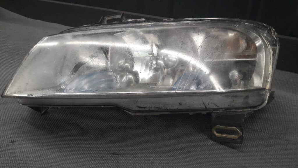 SX40795748 Reflektor lewy Fiat Stilo 192 Kombi