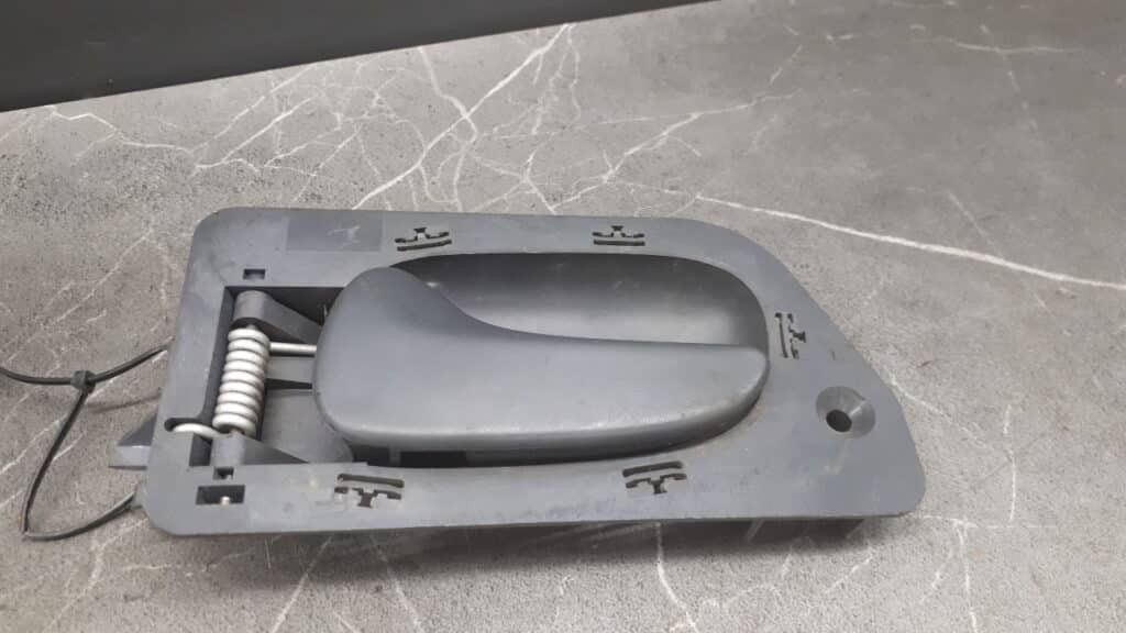 7700823286n Klamka Wewnętrzna Lewa Tył Renault Laguna I