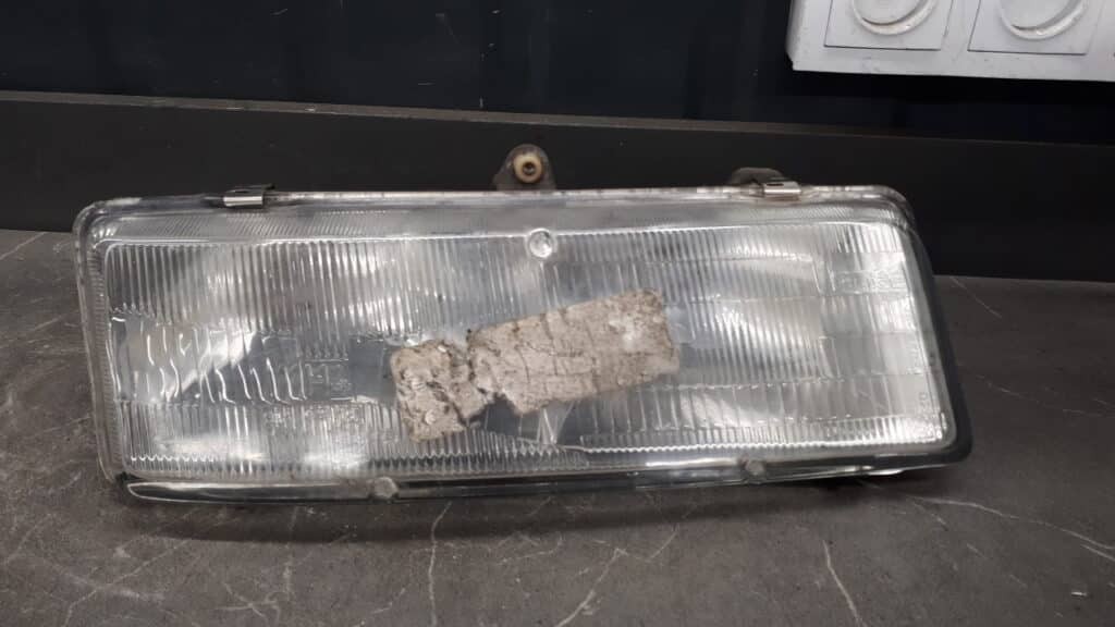 16516400 reflektor prawy pontiac transporter 94r