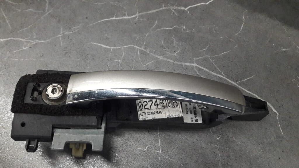 4S71X219A65EE klamika zewnetrzna LEWY PRZOD MONDEO