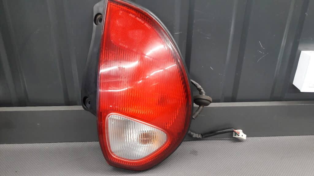 220-51576 Lampa lewy tył DAIHATSU SIRION