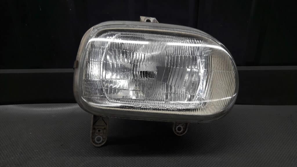 110-51289R reflektor lewy Daihatsu Cuore 91R