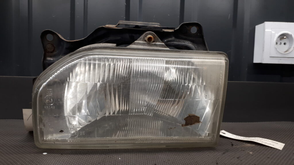 110-61238 reflektor lewy mazda 121 da 90r koito