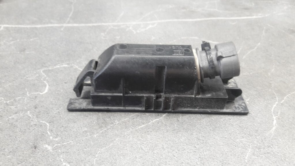 09164143 Lampka tablicy rejestracyjnej Opel Corsa C