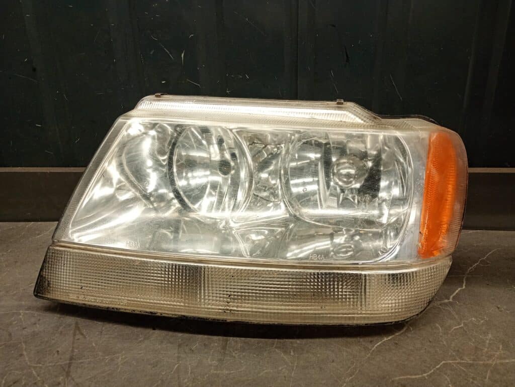 Reflektor lewy grand cherokee wj lift