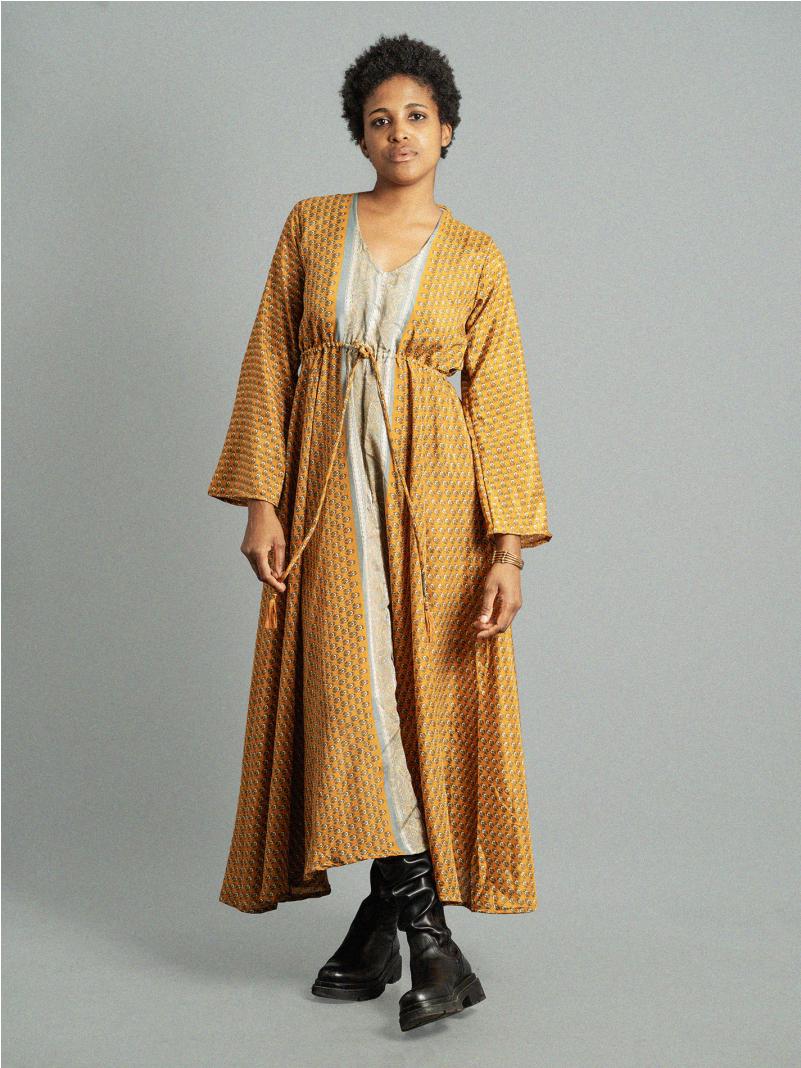 Abito con schiena scoperta fiorellini bianchi – Sikh