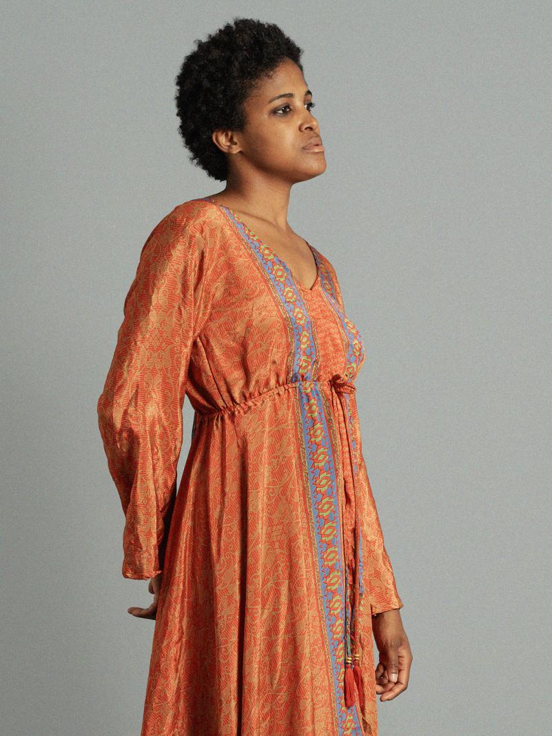 Abito con schiena scoperta arancione – Sikh