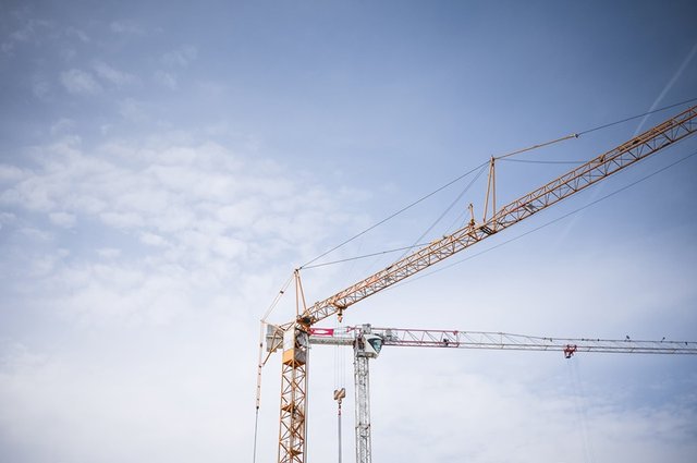 buildings-construction-construction-site-cranes-9a375b9ebfc1fa41f30ffc4cee287bb3