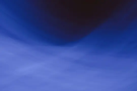 An abstract image with blurred blue tones transitioning from dark indigo at the top to lighter periwinkle at the bottom.…