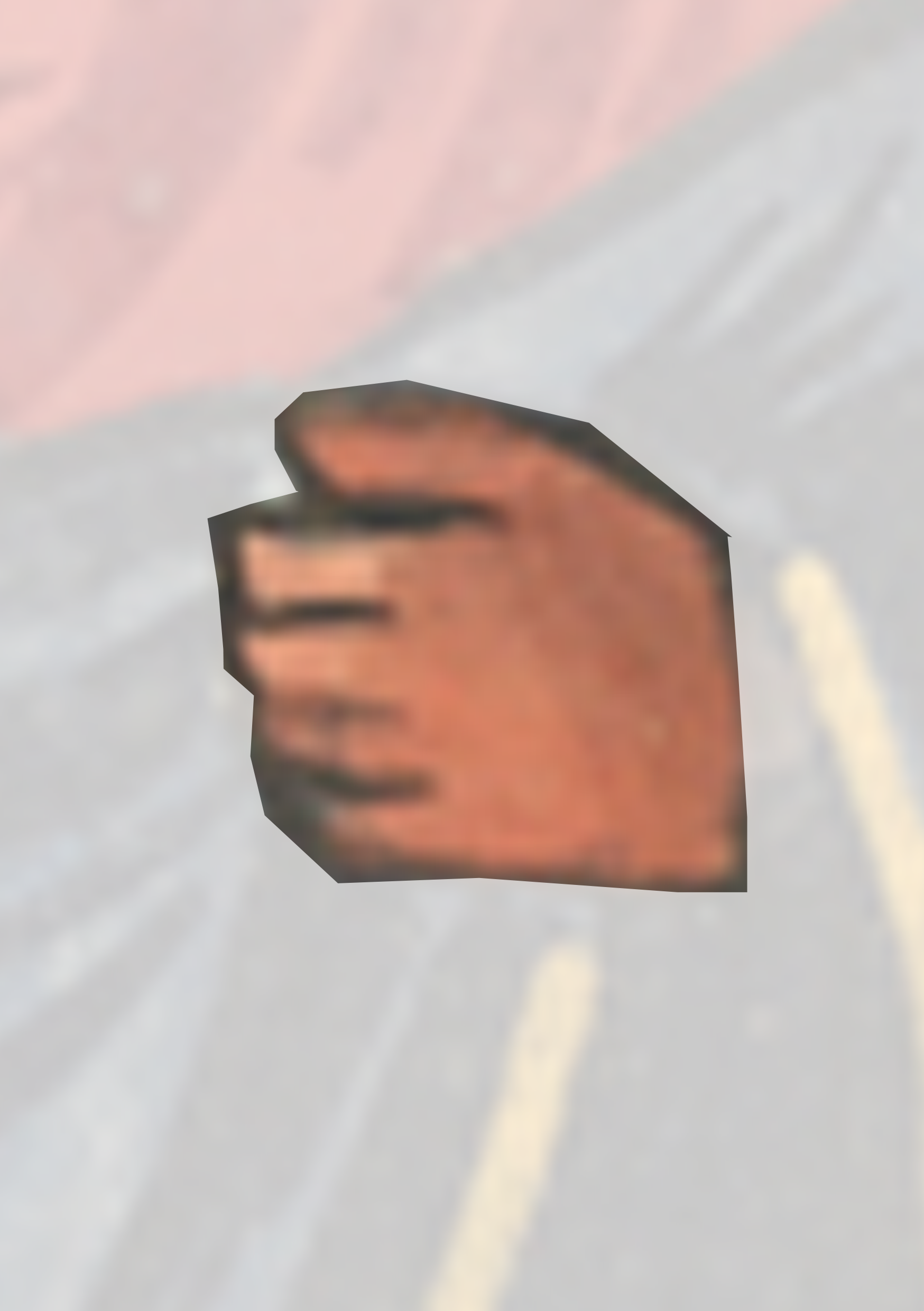 Hand Is Shown In The Middle Of A Road