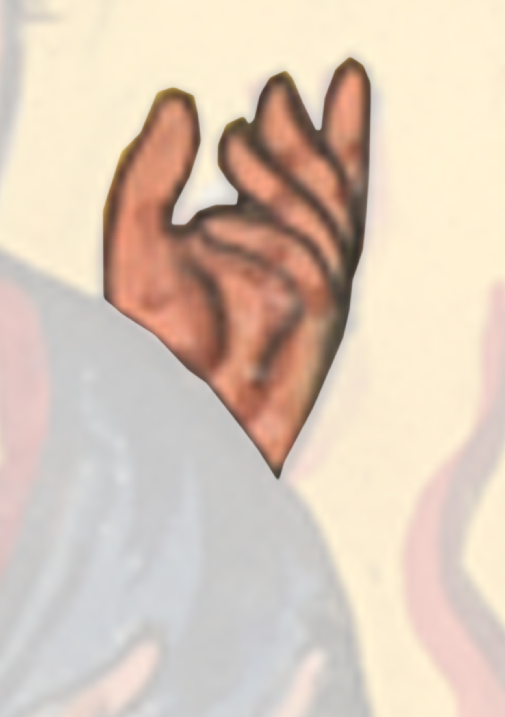 Hand Is Shown In The Middle Of A Photo