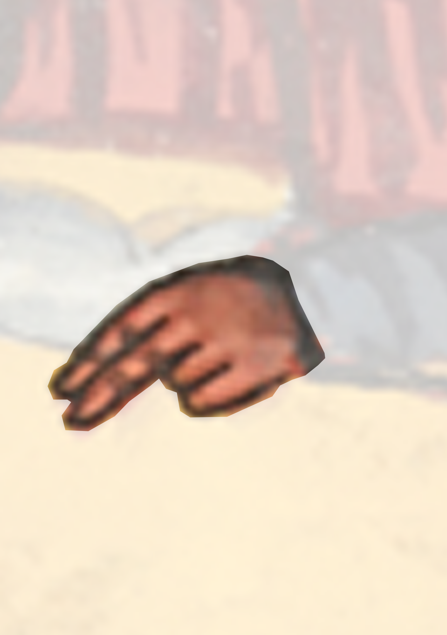 Hand Reaching Out Of A Red Object